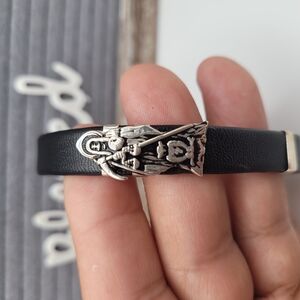 Black Leather Bracelet with Silver Saint Charm